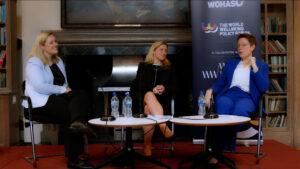 Sarah Cunningham, Kim Leadbeater MP and Tracey Crouch MP on stage at the World Wellbeing Policy Forum