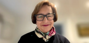 Photo of Prof Amanda Kirby on the Working on Wellbeing podcast