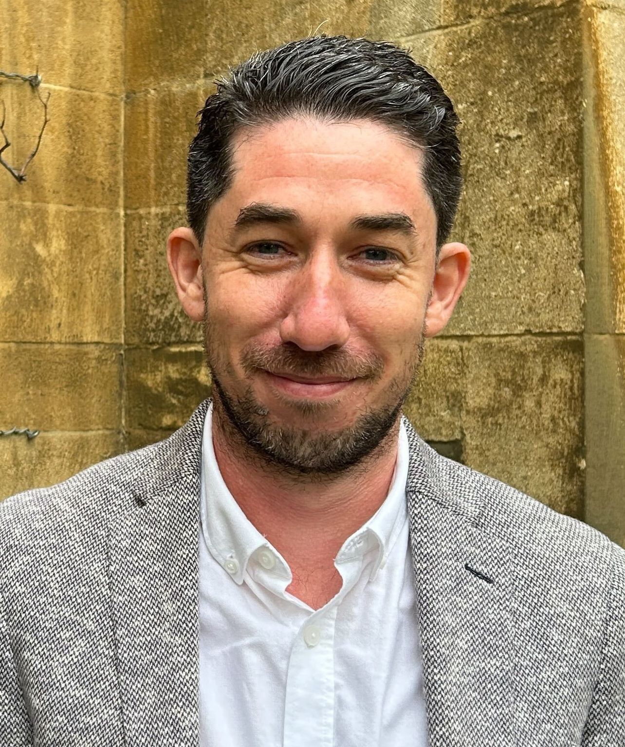 Head and shoulder image of Ben Wealthy