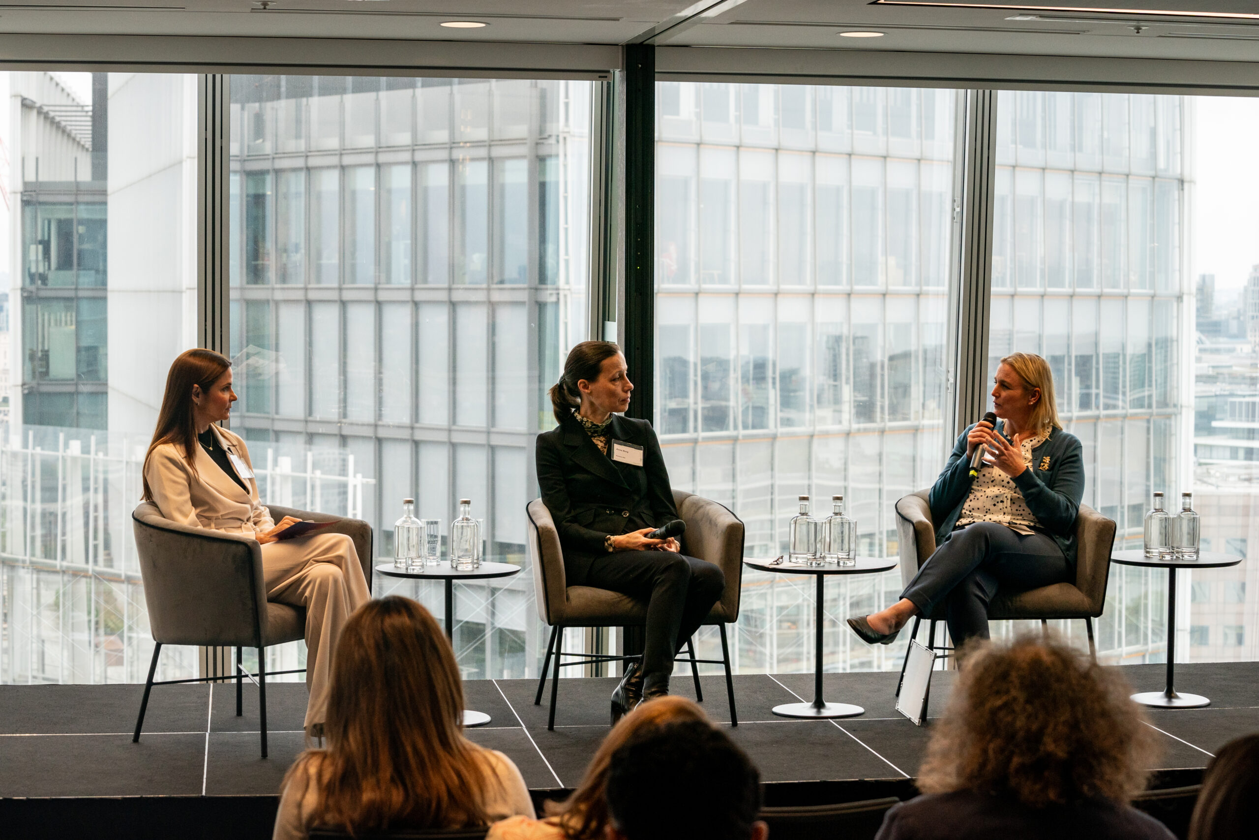 Karen Guggenheim, Anna Borg, and Nancy Hey at the World Wellbeing Policy Forum 2025